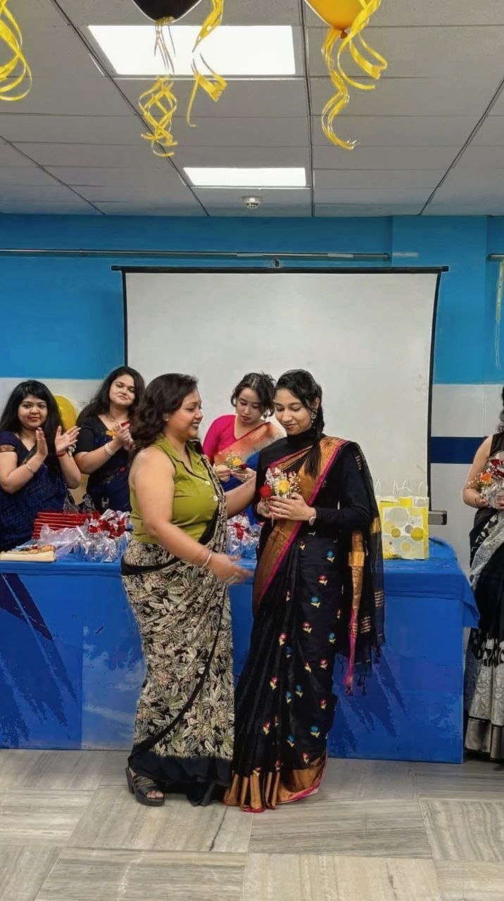 Tahamira ARmin receiving award from SSKM professor